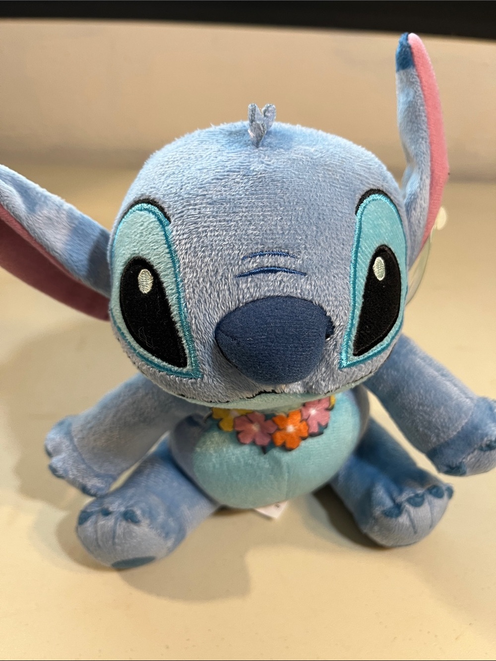 Disney Light Blue Stitch Plush with Pink & Orange Flower Lei